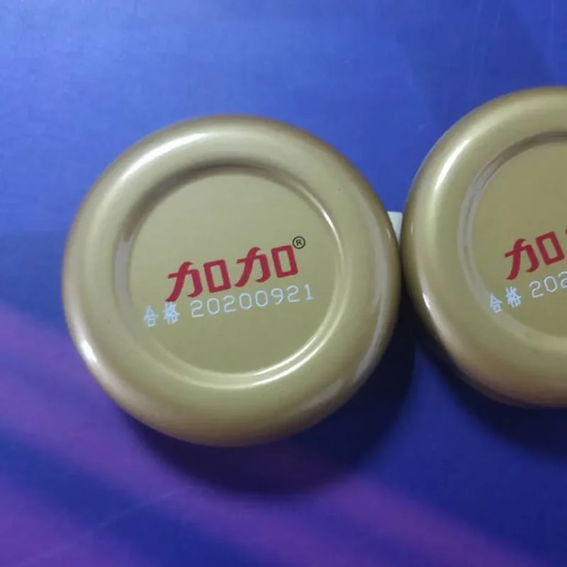 CO2 laser date code marking on bottle caps