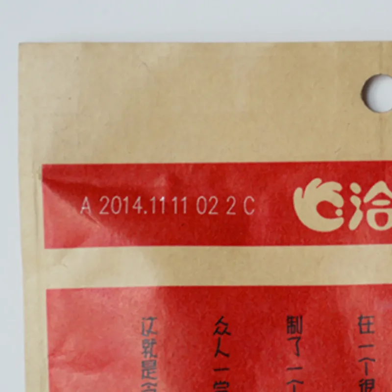CO2 laser date code marking on carton packaging