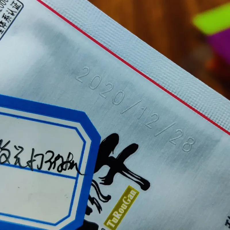 CO2 laser date code on packaging film