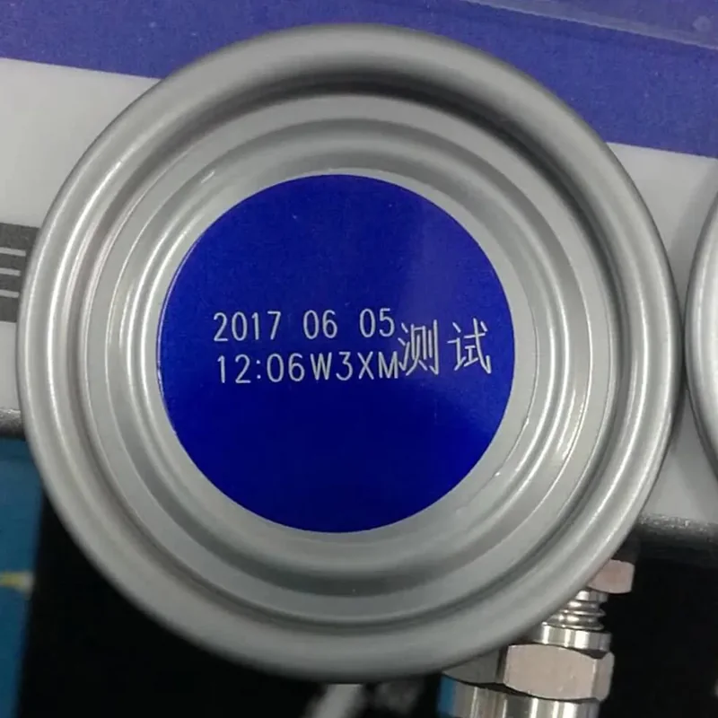 Fiber laser date code marking on a can lid