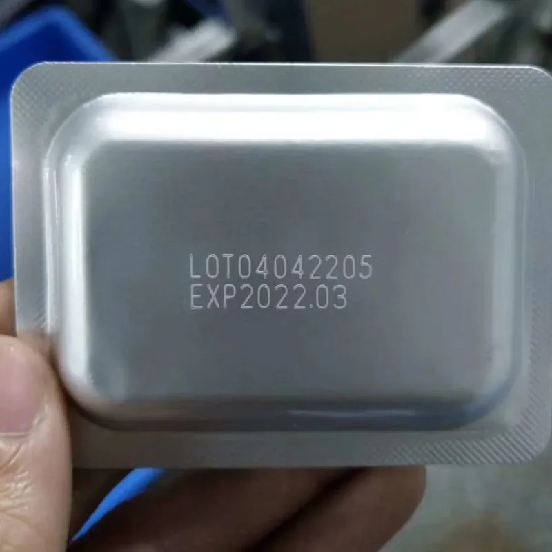 Fiber laser lot code marking on a metal container