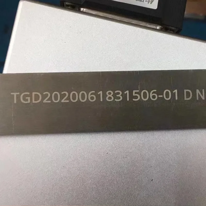 Fiber laser serial and text marking on a metal strip