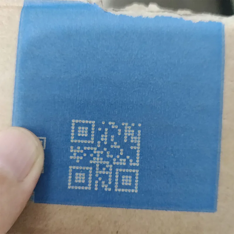 UV laser marking of a QR code on carton packaging