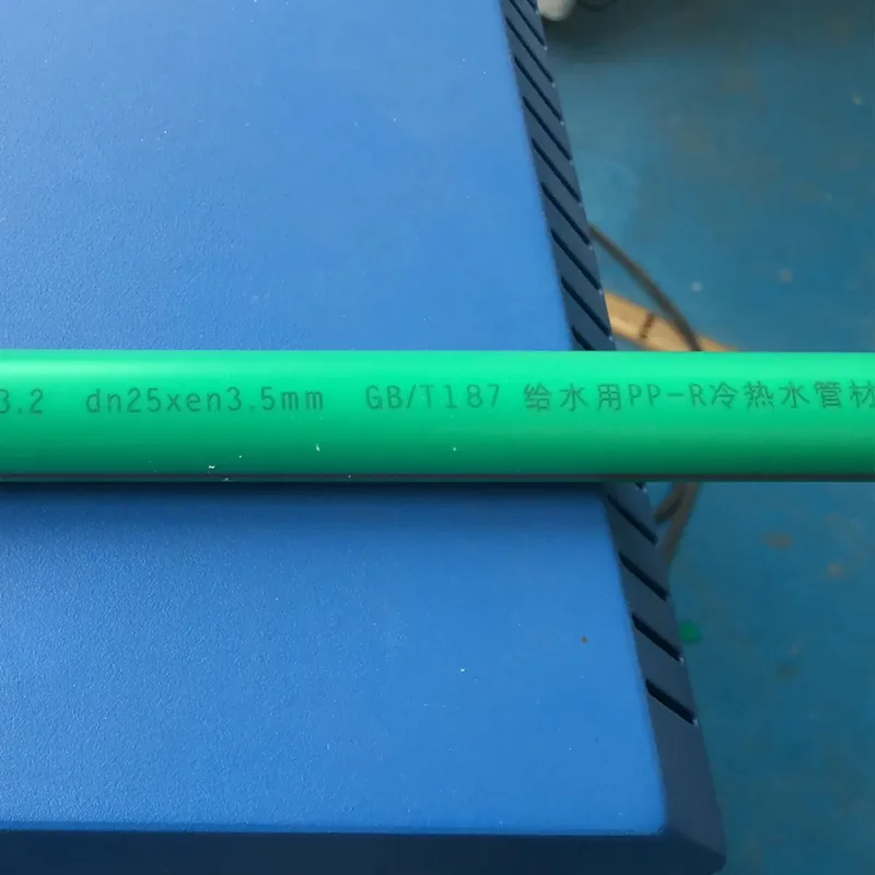 UV laser text marking on green PPR pipe